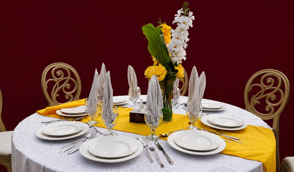 white table plates on it, Mahnoor Events